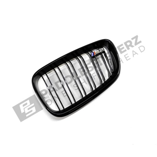 OEM BMW gloss black front grille for F87 M2 51712355448 right side photographed from the front