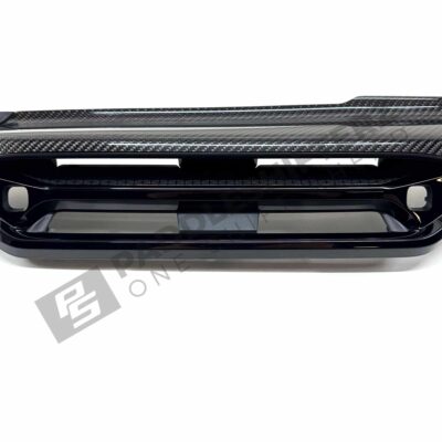 Close up shot of the OEM BMW LCI Carbon fiber dashboard trim LHD – 51459633604, showing the center