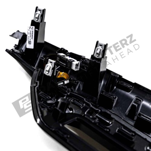 Close up shot of the clips on the OEM BMW LCI Carbon fiber dashboard trim RHD - 51459633605