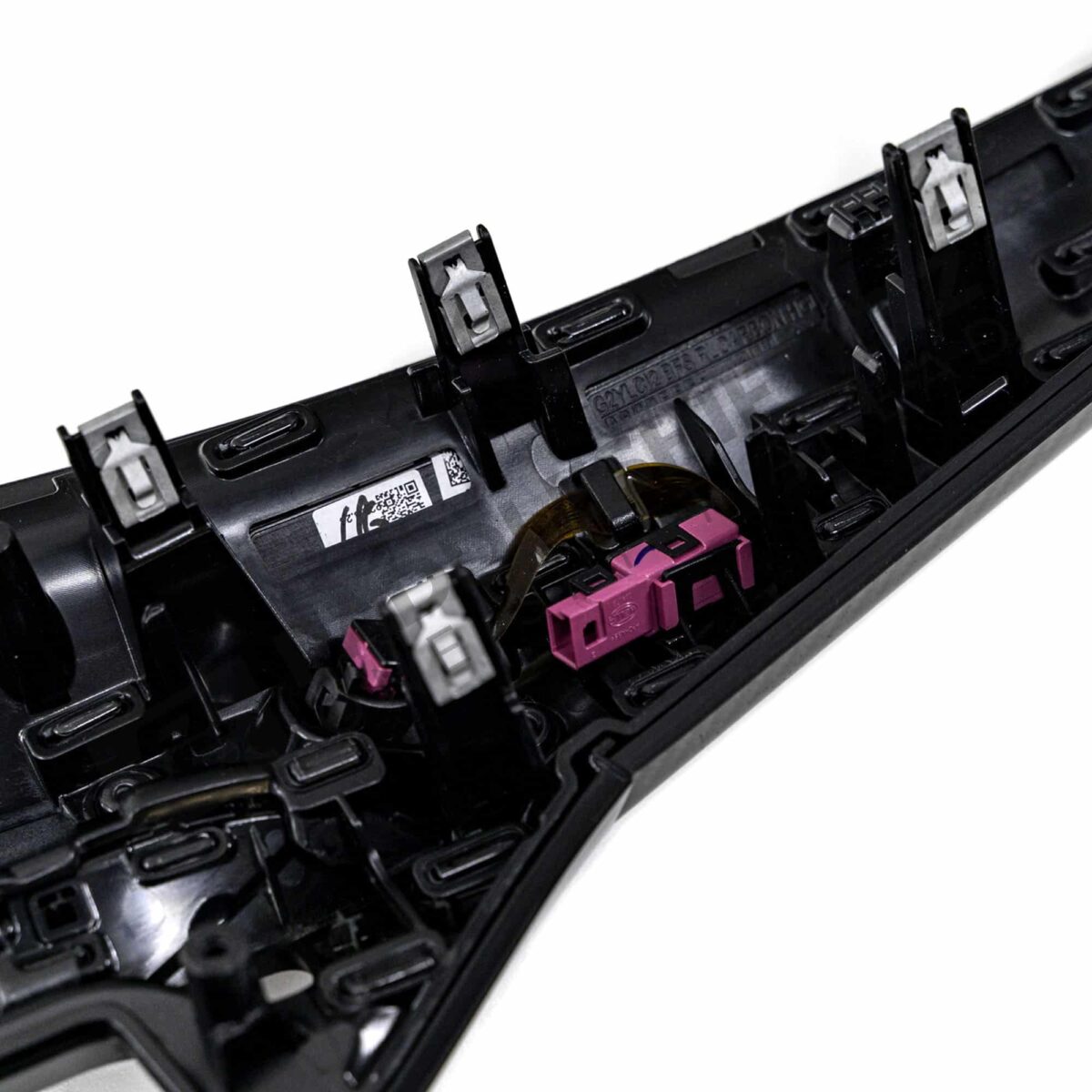 Close up shot of the connectors on the OEM BMW LCI Carbon fiber dashboard trim RHD - 51459633605