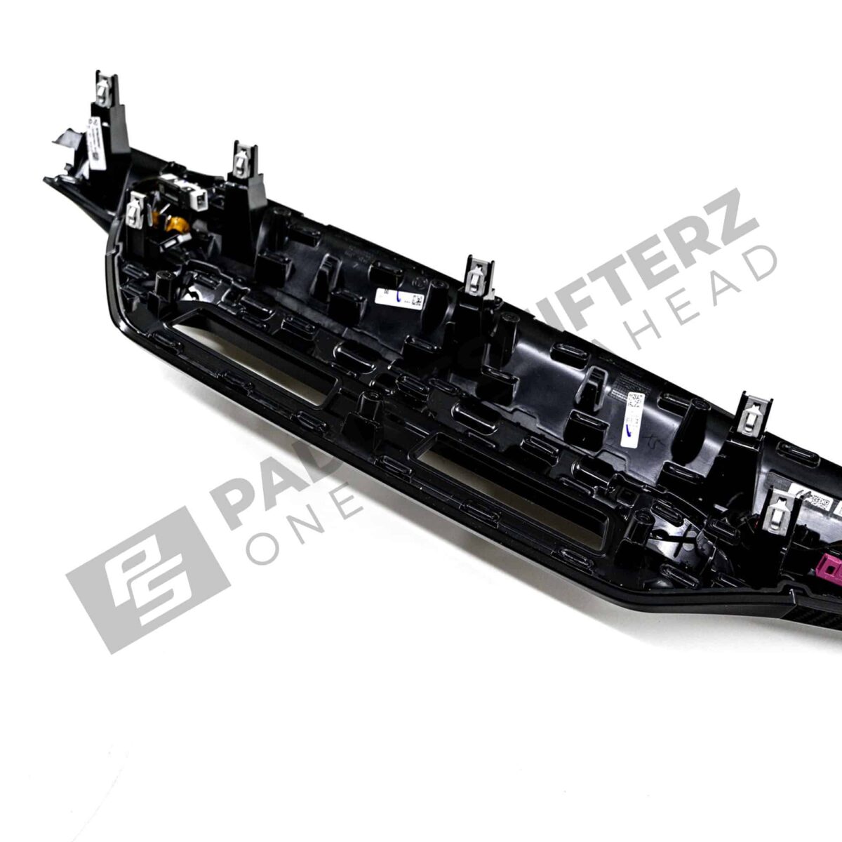 Close up shot of the rear of the OEM BMW LCI Carbon fiber dashboard trim RHD - 51459633605