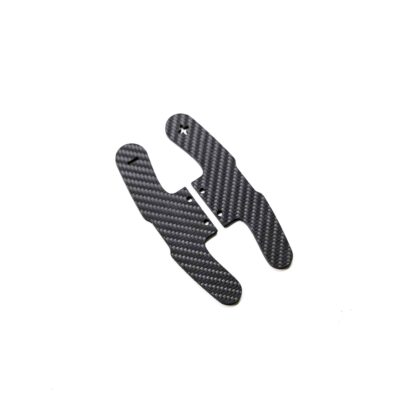 Structured carbon fiber paddle shifters plates for BMW F series models in Motorsport style photographer from a slight angle