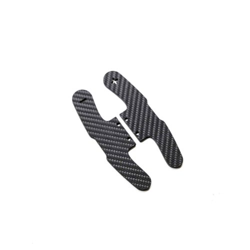 Structured carbon fiber paddle shifters plates for BMW F series models in Motorsport style photographer from a slight angle