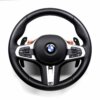 Gloss carbon fiber paddle shifters for F/G Series and Supra on a BMW M steering wheel