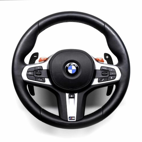 Gloss carbon fiber paddle shifters for F/G Series and Supra on a BMW M steering wheel