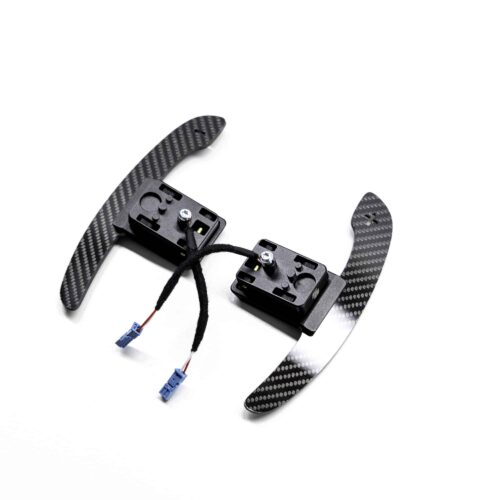 Gloss carbon fiber paddle shifters with magnetic component on a white background