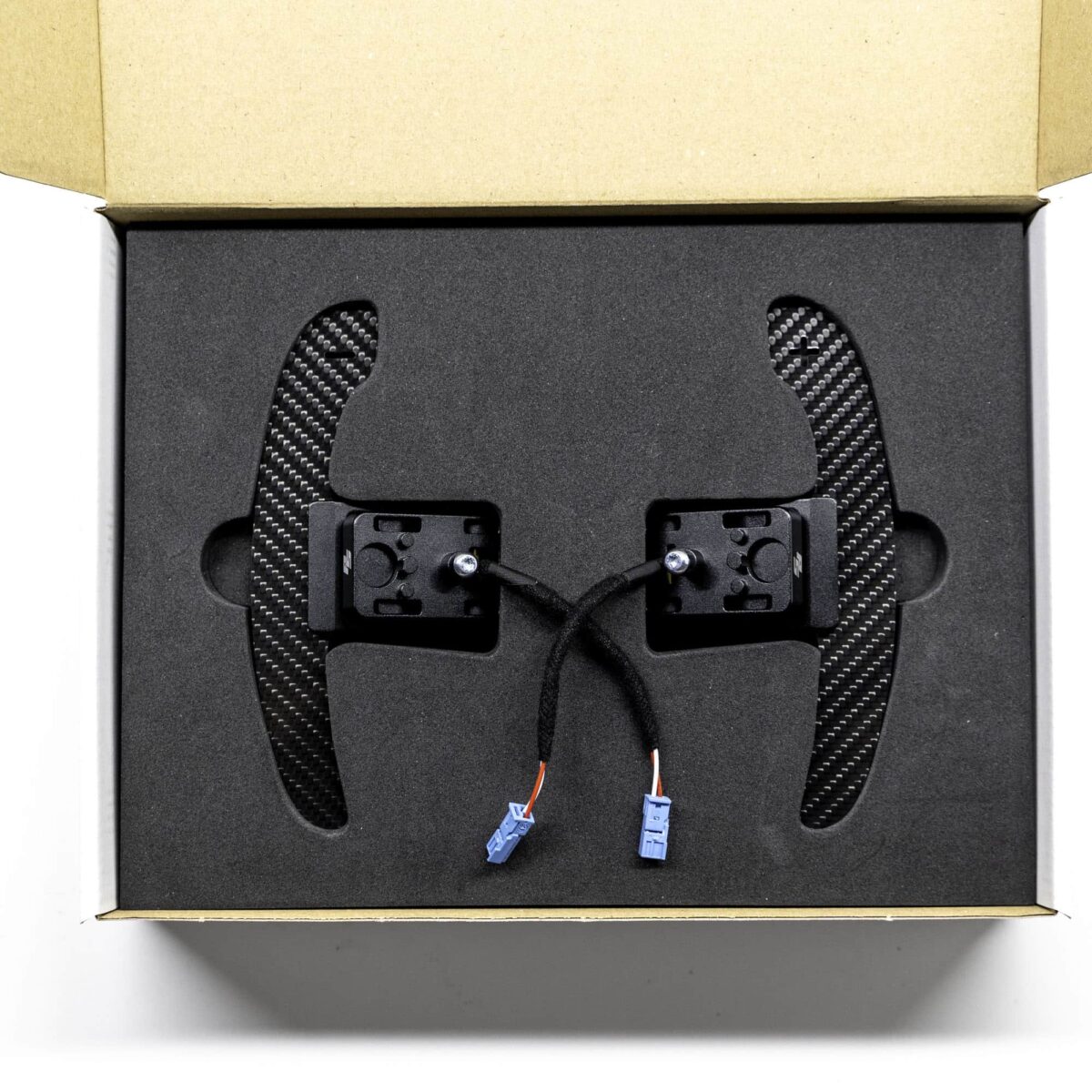 Gloss carbon fiber magnetic paddle shifters in a box with foam insert