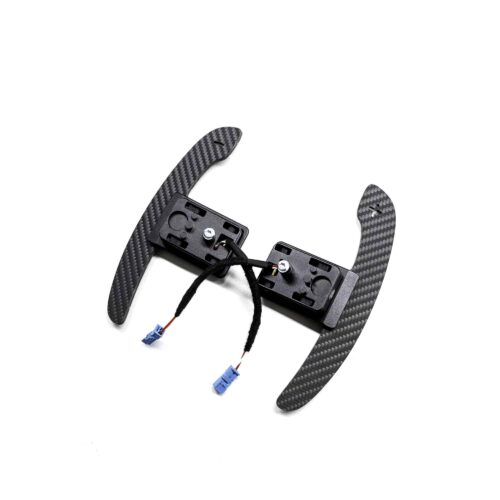 Structured carbon fiber paddle shifters with magnetic components photographed on a white background