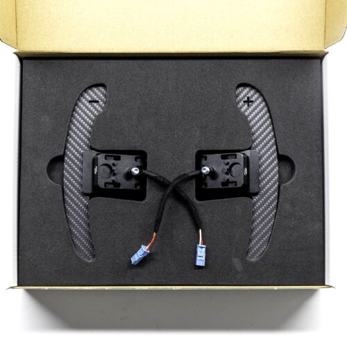 Structured carbon fiber paddle shifters with magnetic component in a box with foam insert
