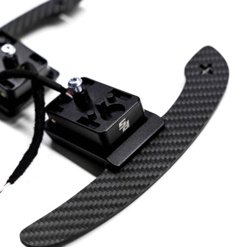Magnetic paddle shifters, structured carbon BMW G close up