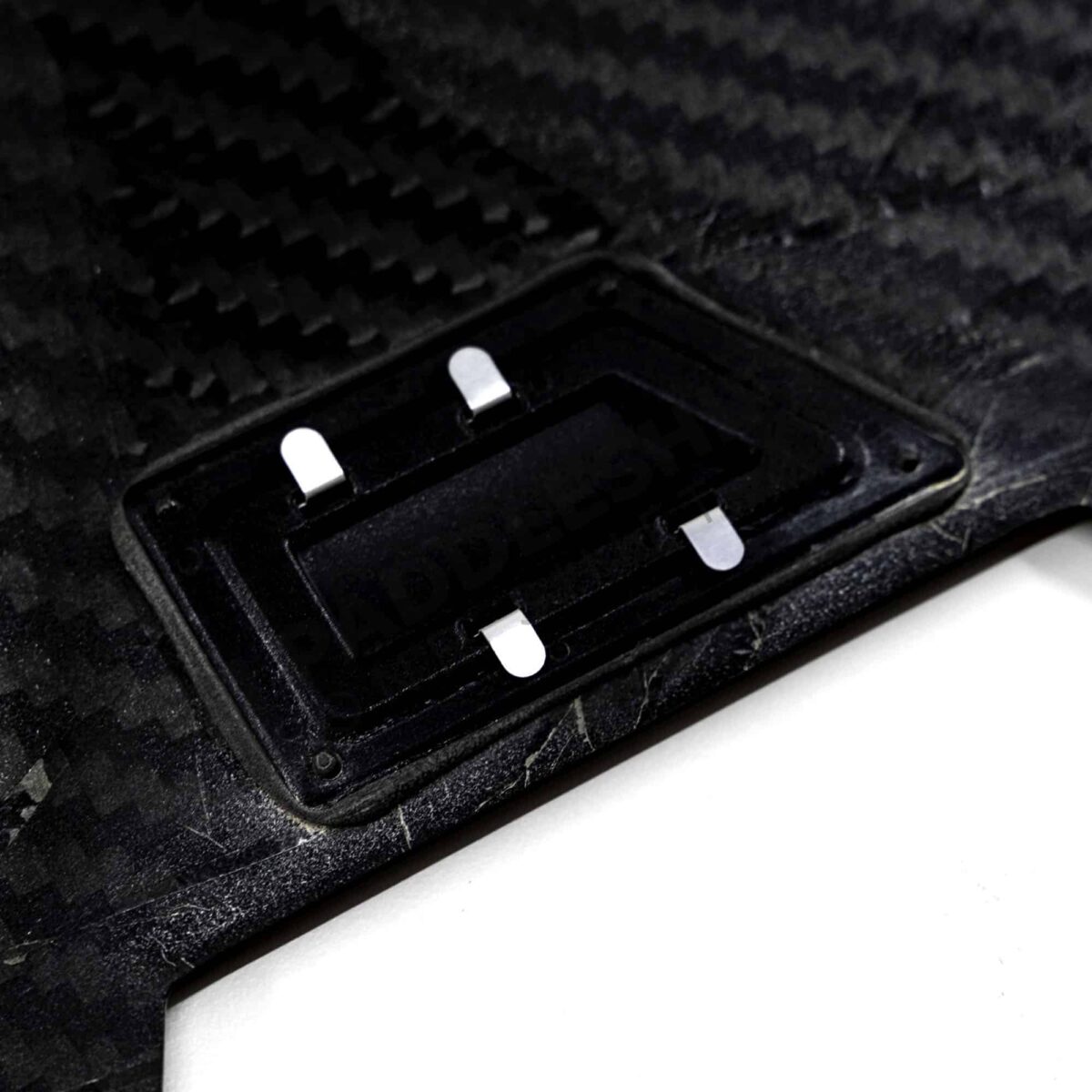 Rear view of the logo of the OEM BMW M Performance carbon engine cover - 11148058667