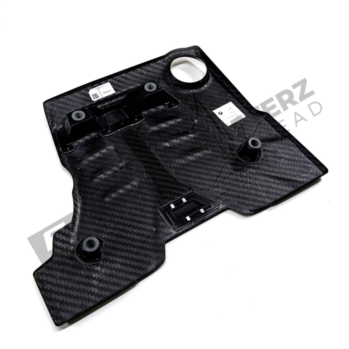 Rear side view of the OEM BMW M Performance carbon engine cover - 11148058667