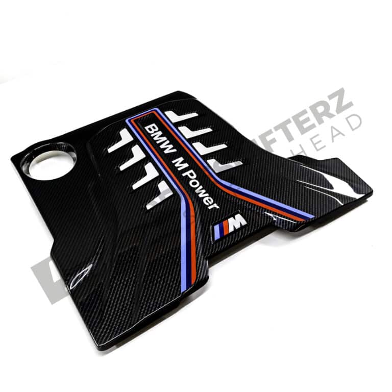 Side view of the OEM BMW M Performance carbon engine cover - 11148058667