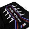 Close up view of the BMW M Power logo on the OEM BMW M Performance carbon engine cover - 11148058667