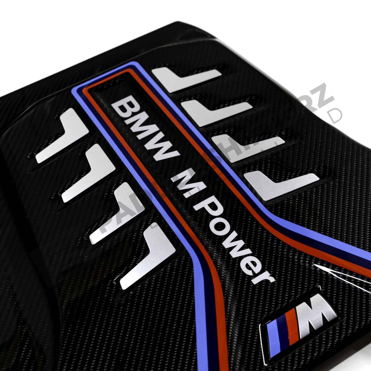 Close up view of the BMW M Power logo on the OEM BMW M Performance carbon engine cover - 11148058667