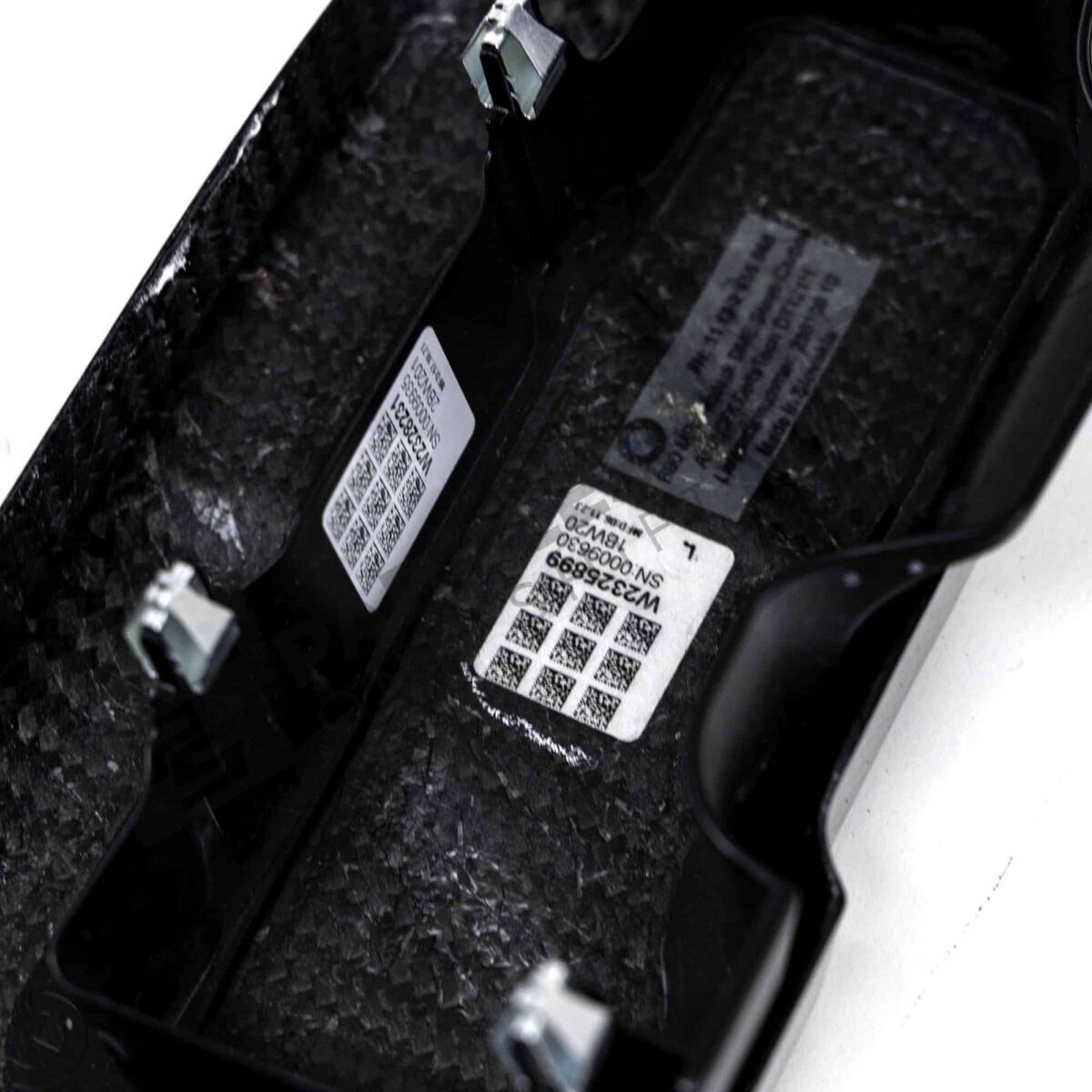 Label on OEM BMW M carbon engine cover extension set - 11122455570