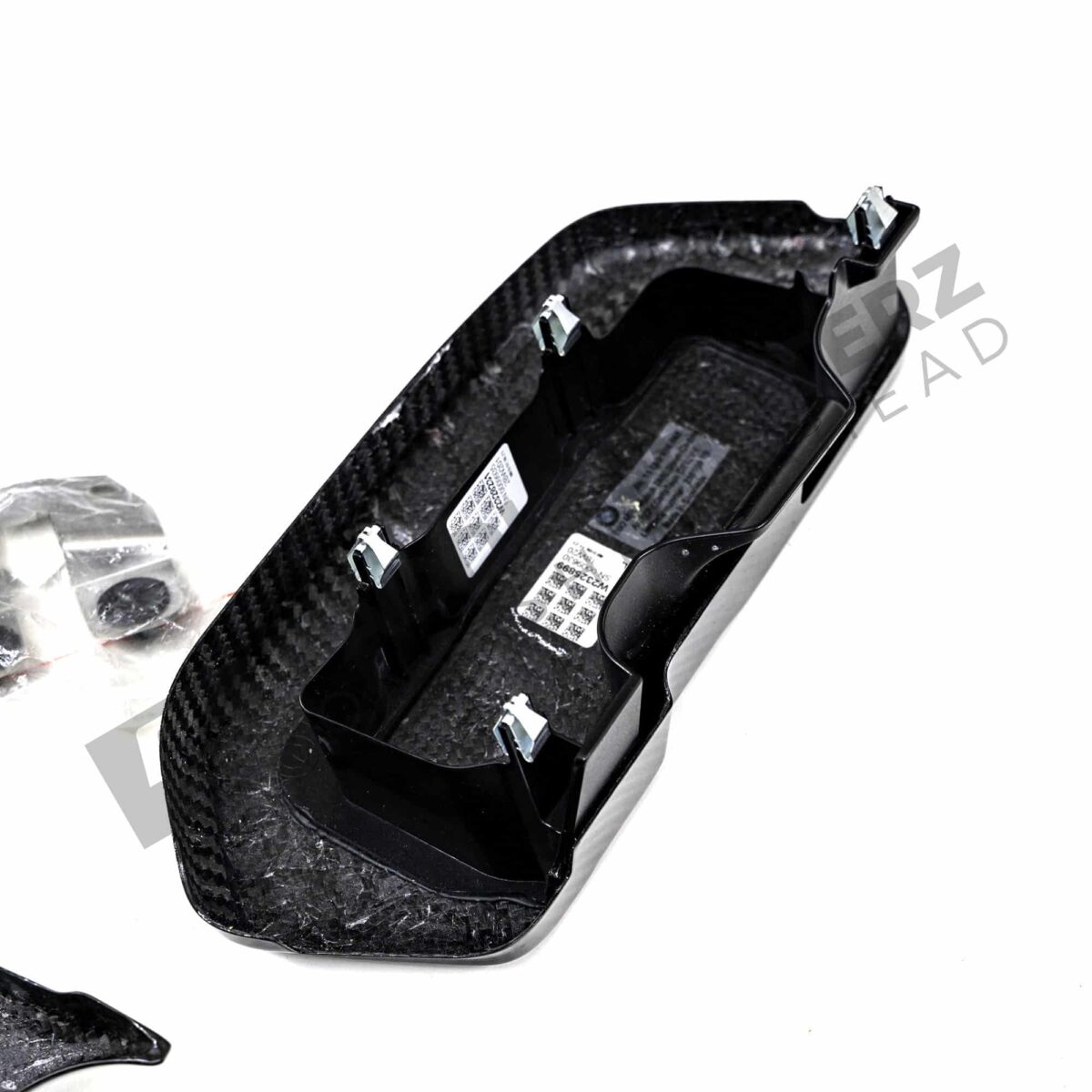 Bottom of left OEM BMW M carbon engine cover extension set - 11122455570