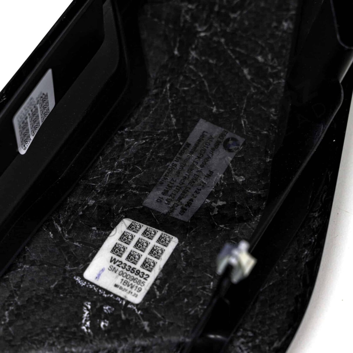 Close up of bottom of OEM BMW M carbon engine cover extension set - 11122455570