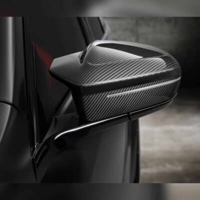 OEM BMW M Carbon fiber mirror caps for BMW G90 and G99 M, installed on a G99 M5