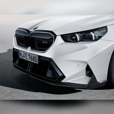OEM BMW M Performance Front Carbon fiber splitter set 51115A7D671, 51115A7D672 on a BMW G90 M5