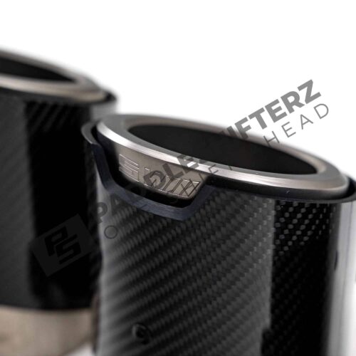 OEM BMW M performance carbon, titanium exhaust tip G90 G99 M5 18305B35D87 close up view