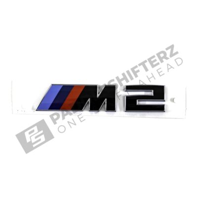Front view of OEM BMW G87 M2 LCI trunk badge 51147907772