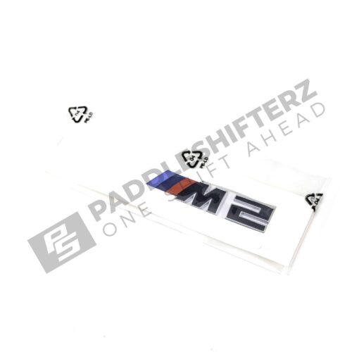 Side view of OEM BMW G87 M2 LCI trunk badge 51147907772