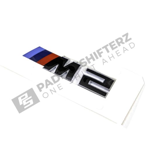 Top side view of OEM BMW G87 M2 LCI trunk badge 51147907772