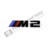 Front view of OEM BMW G87 M2 LCI trunk badge 51147907772