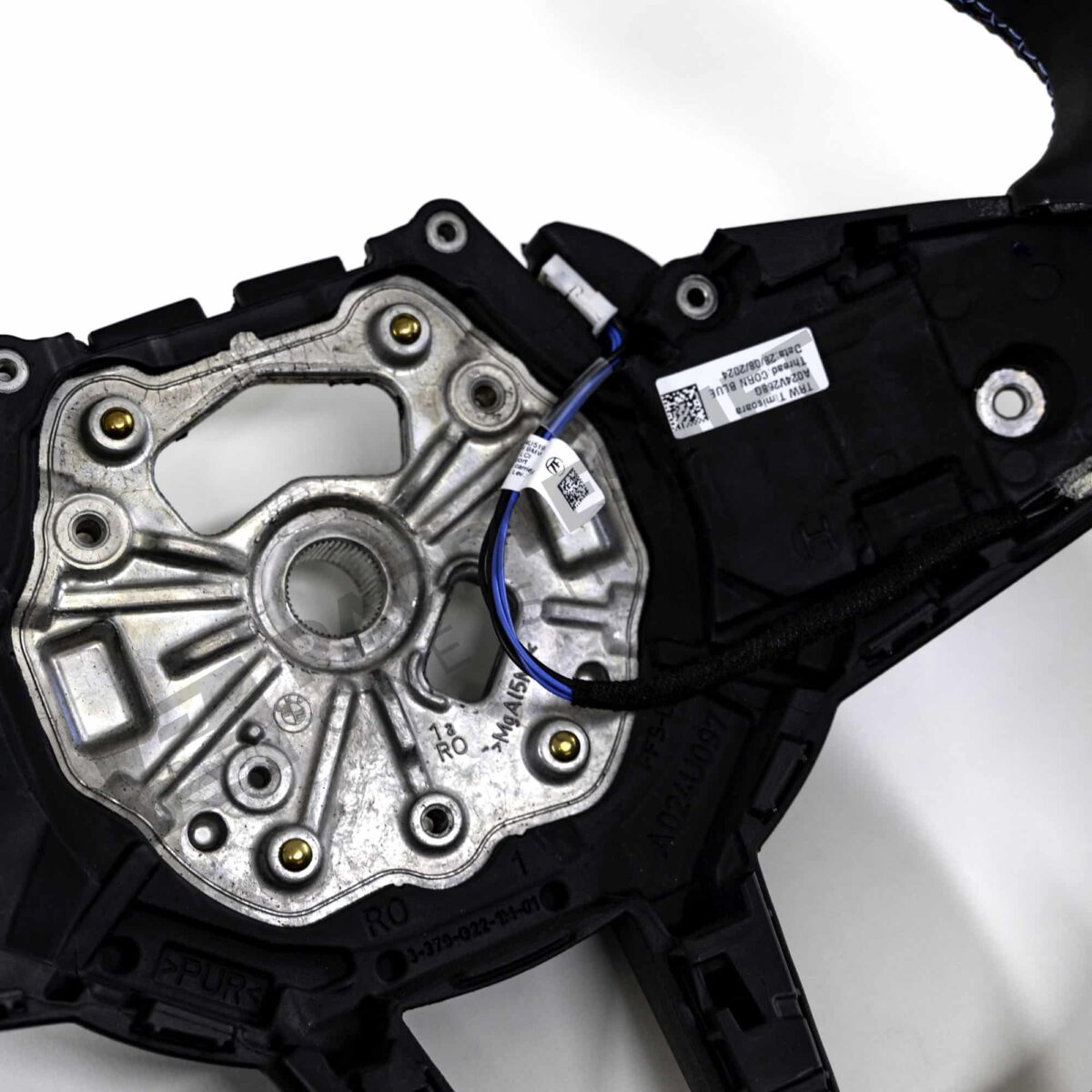Close up view of OEM BMW M Flat bottom leather steering wheel - 32305A8A900