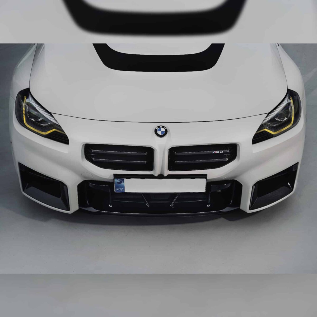 Top view of INDIV Carbon fiber front grilles for BMW G87 M2