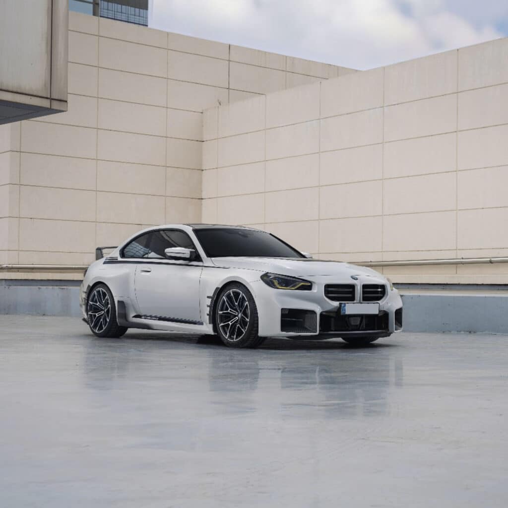 Side, far shot of INDIV Carbon fiber front grilles for BMW G87 M2