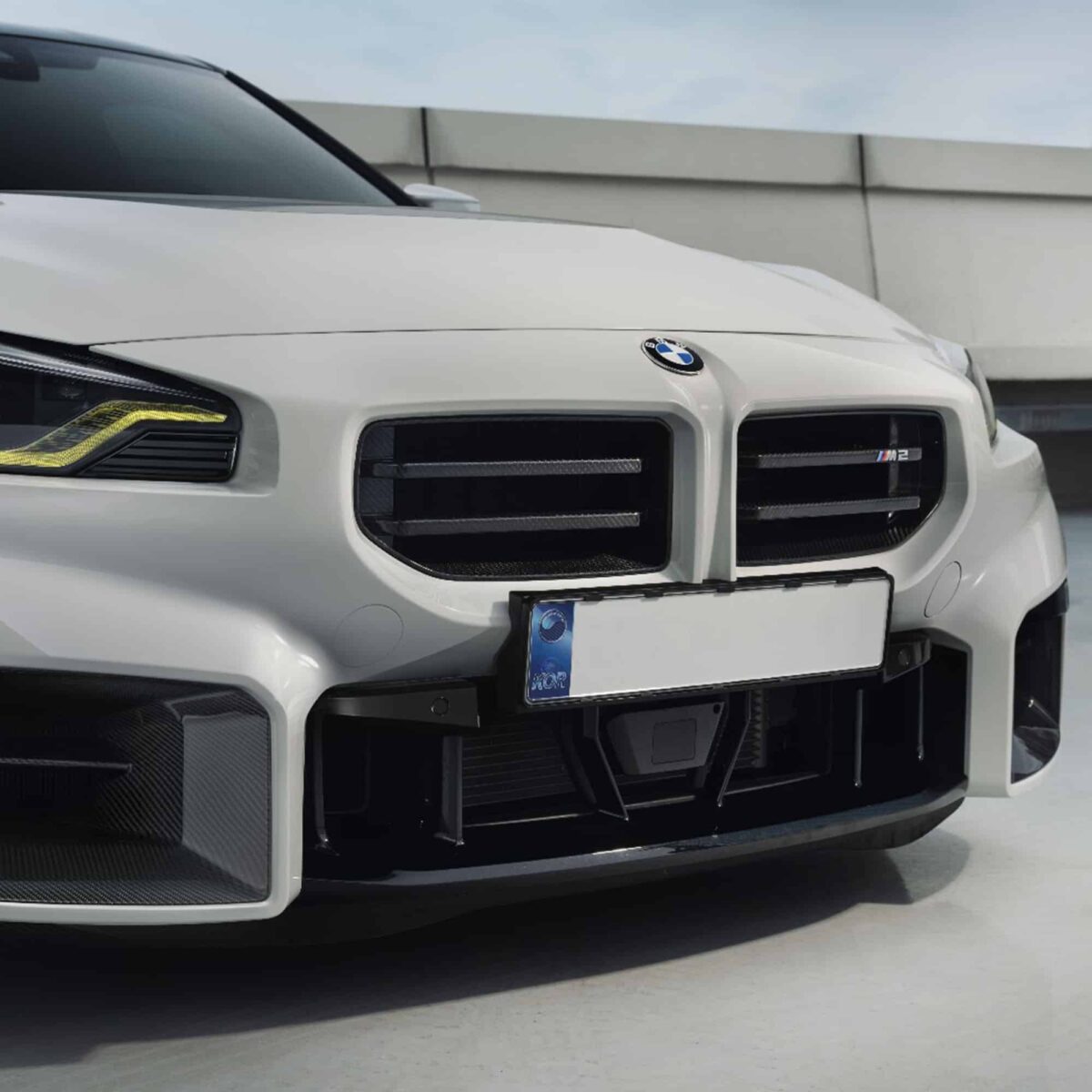INDIV Carbon fiber front grilles for BMW G87 M2 installed on an M2 from the side
