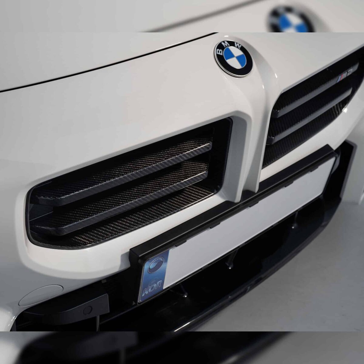 Close up of INDIV Carbon fiber front grilles for BMW G87 M2