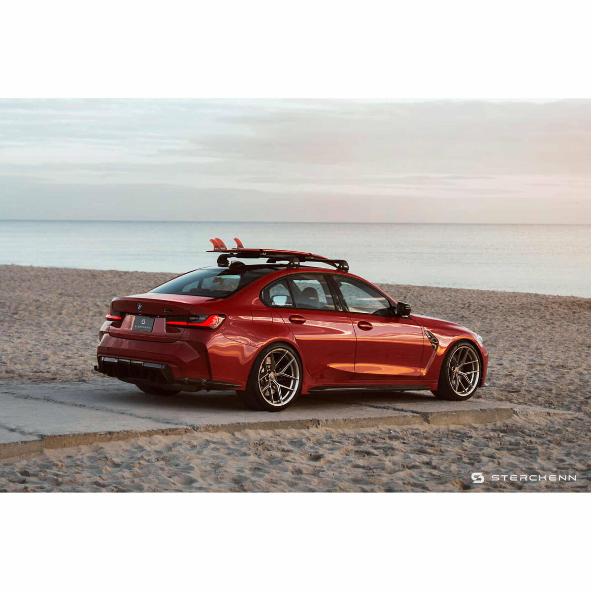 Sterckenn Carbon fiber rear bumper inserts for G8X M3, G80 M3 on the beach