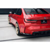 Rear side view of Sterckenn Carbon fiber rear bumper inserts for G8X M3