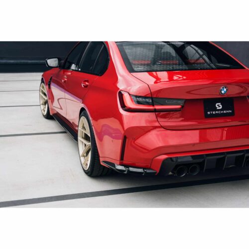 Rear side view of Sterckenn Carbon fiber rear bumper inserts for G8X M3