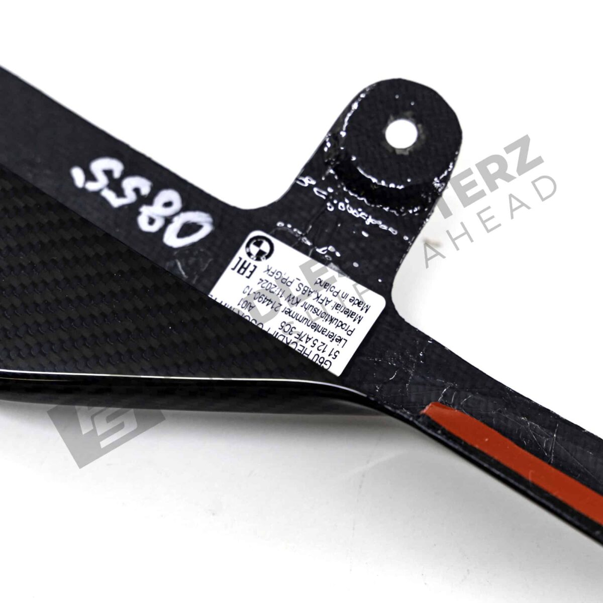 OEM BMW M Performance Carbon fiber diffuser center - 51125A7F3C5 close up of label