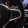 Close up of the right side aluminium paddle shifter in silver color