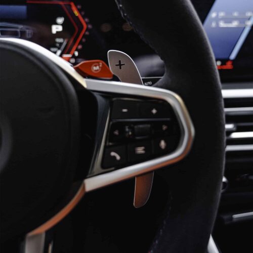 Close up of the right side aluminium paddle shifter in silver color