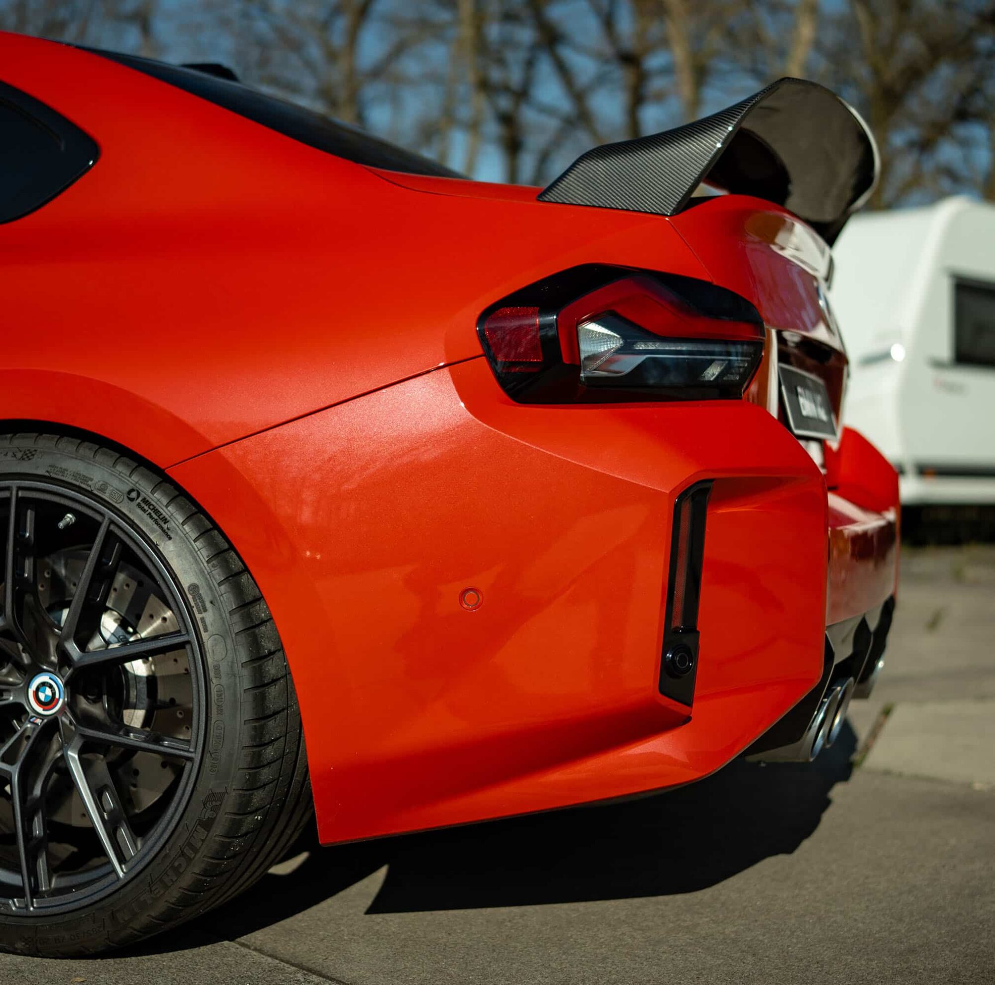 PaddleShifterz Full Carbon fiber Rear Wing for BMW G87 M2 by Faserschmiede GmbH on a toronto red G87 M2