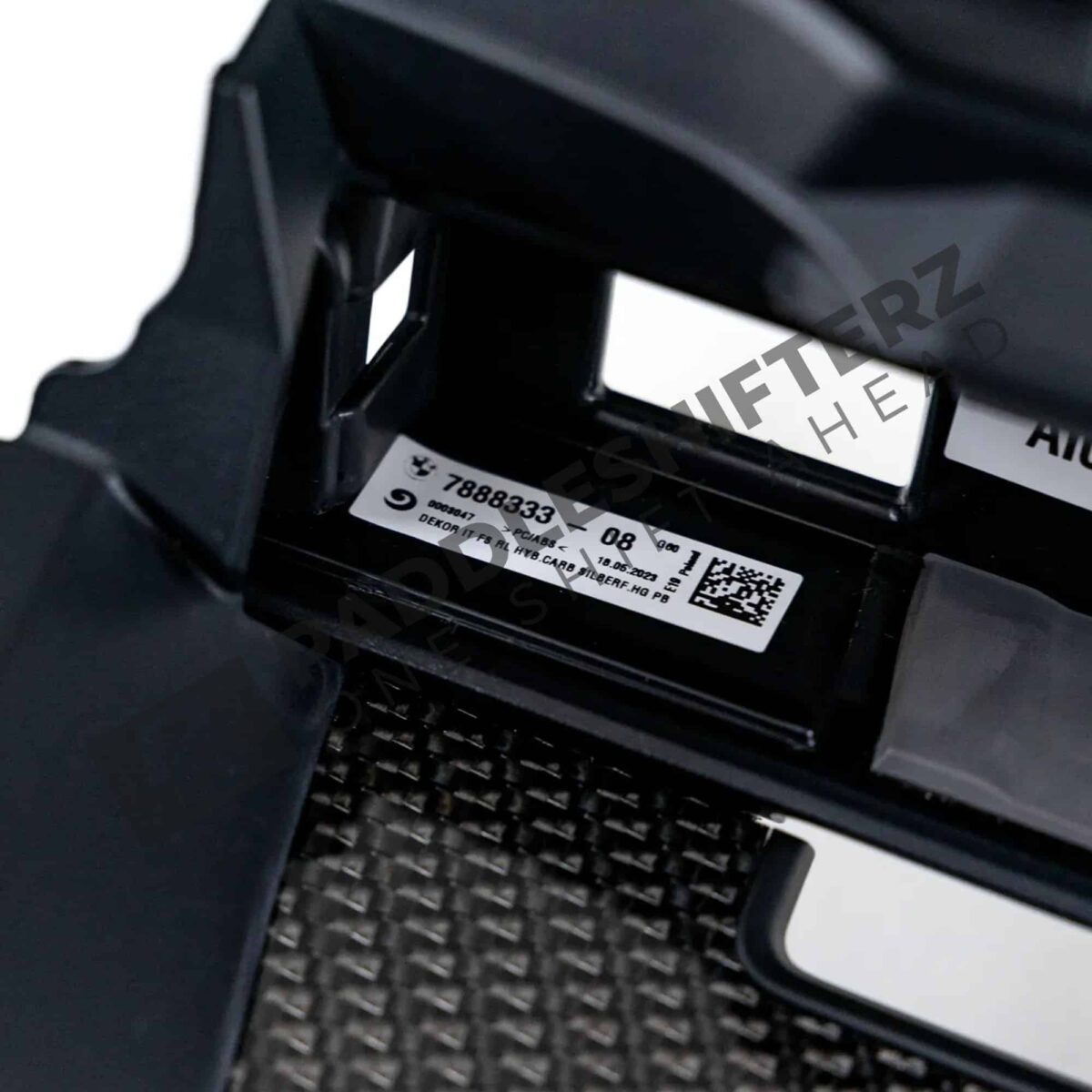 Close up of OEM BMW Carbon fiber driver side air vent 5 series 51457888333