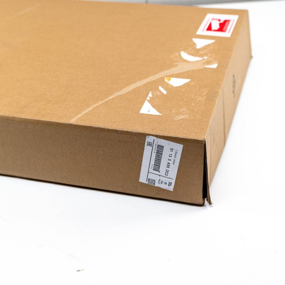 Box of OEM BMW G26 Shadowline Front Grille LCI 51135A55DC2