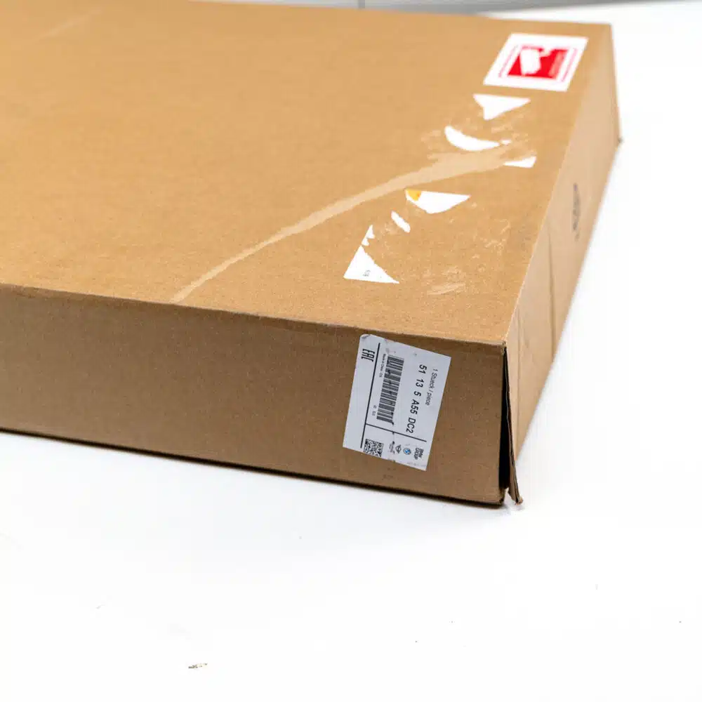 Box of OEM BMW G26 Shadowline Front Grille LCI 51135A55DC2