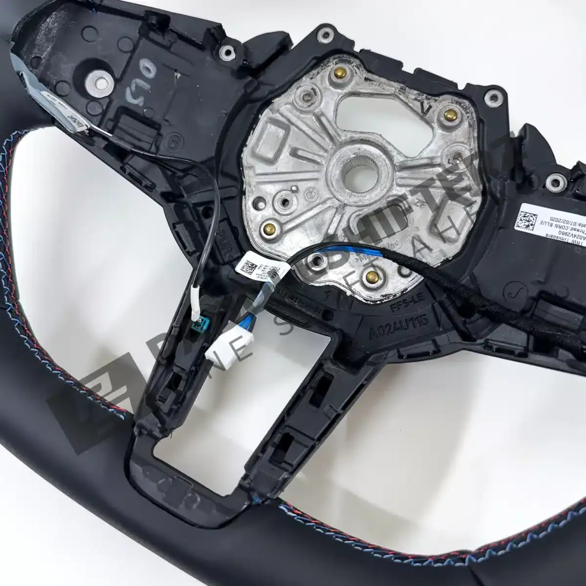 Close up view of OEM BMW M Flat bottom leather steering wheel (Manual) – 32305A8A902