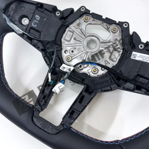 Close up view of OEM BMW M Flat bottom leather steering wheel (Manual) – 32305A8A902