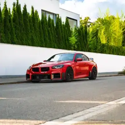 Red G87 M2 with no license plate on