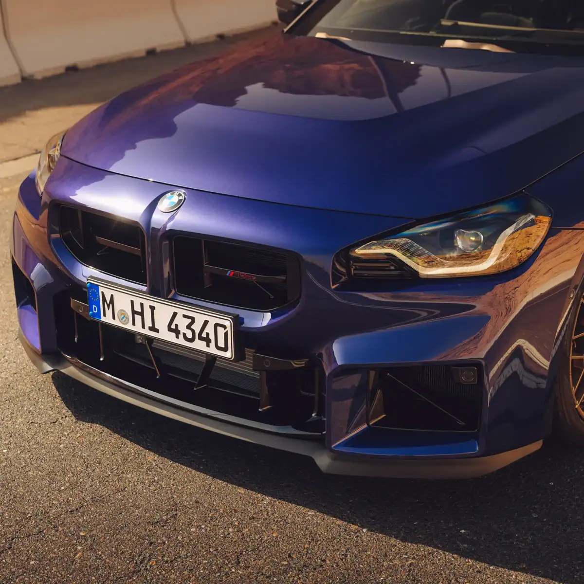 OEM BMW G87 M2 CS Front splitter 51117874202 on a G87 M2 CS velvet purple