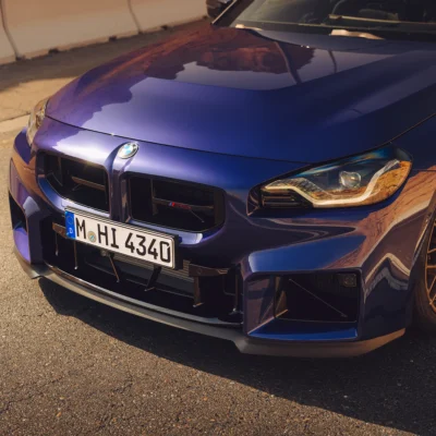 OEM BMW G87 M2 CS Front splitter 51117874202 on a G87 M2 CS velvet purple