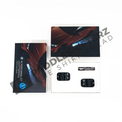 OEM BMW M Performance Light Carpet retrofit kit 63175B61FE1 box and contents